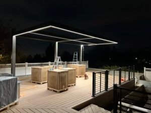 Custom-fabricated LED lighting installed on a stylish outdoor patio cover in Los Angeles, CA by LAProElectrical.