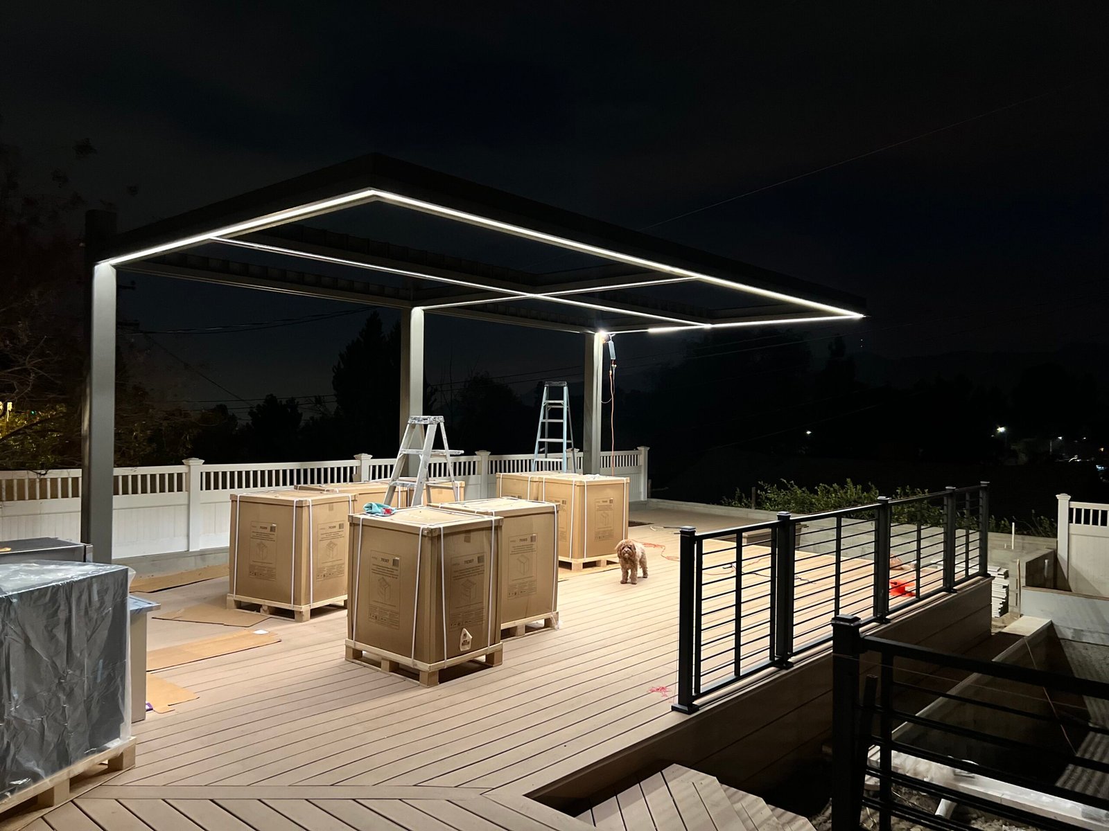 Custom-fabricated LED lighting installed on a stylish outdoor patio cover in Los Angeles, CA by LAProElectrical.