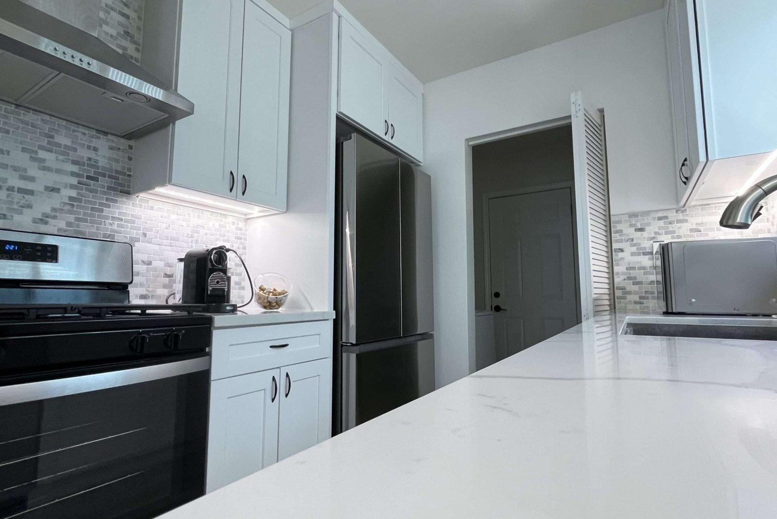 Dedicated electrical wiring for major appliances, including refrigerator, oven, and microwave, ensuring safety and efficiency.